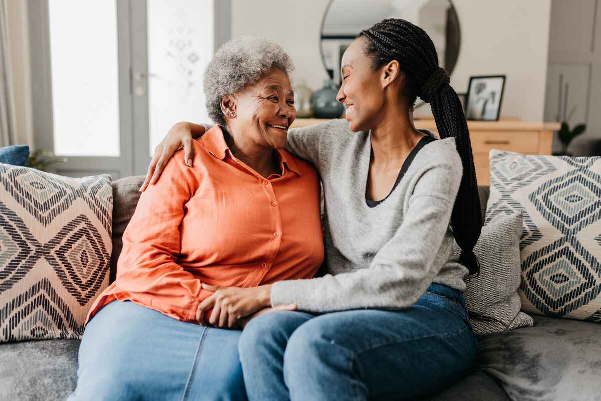 Elderly mother and daughter discuss home health care