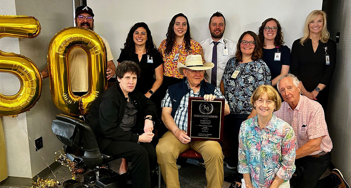 Doug LeMay, recently marked 50 years as a YNHH volunteer